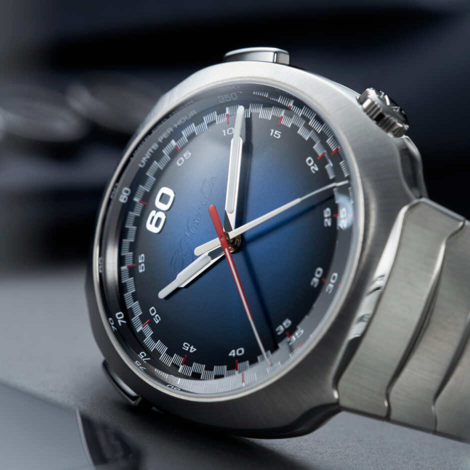 hmoser 6907 1200 streamliner flyback chronograph funky blue 2 lifestyle table closeup